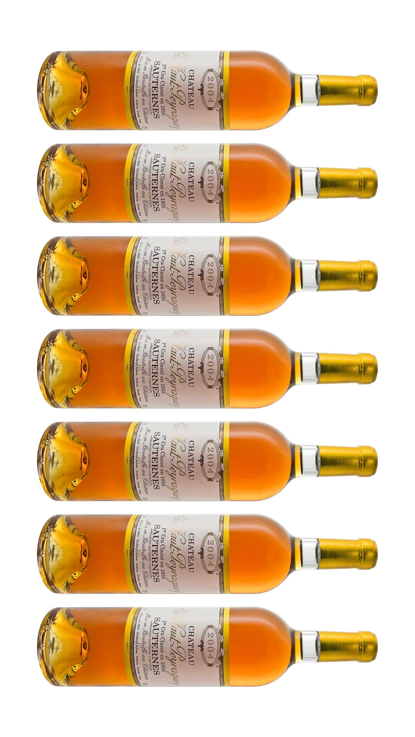 Mehrere Weinflaschen mit Dessertwein von Chateau Clos Haut Peyraguey