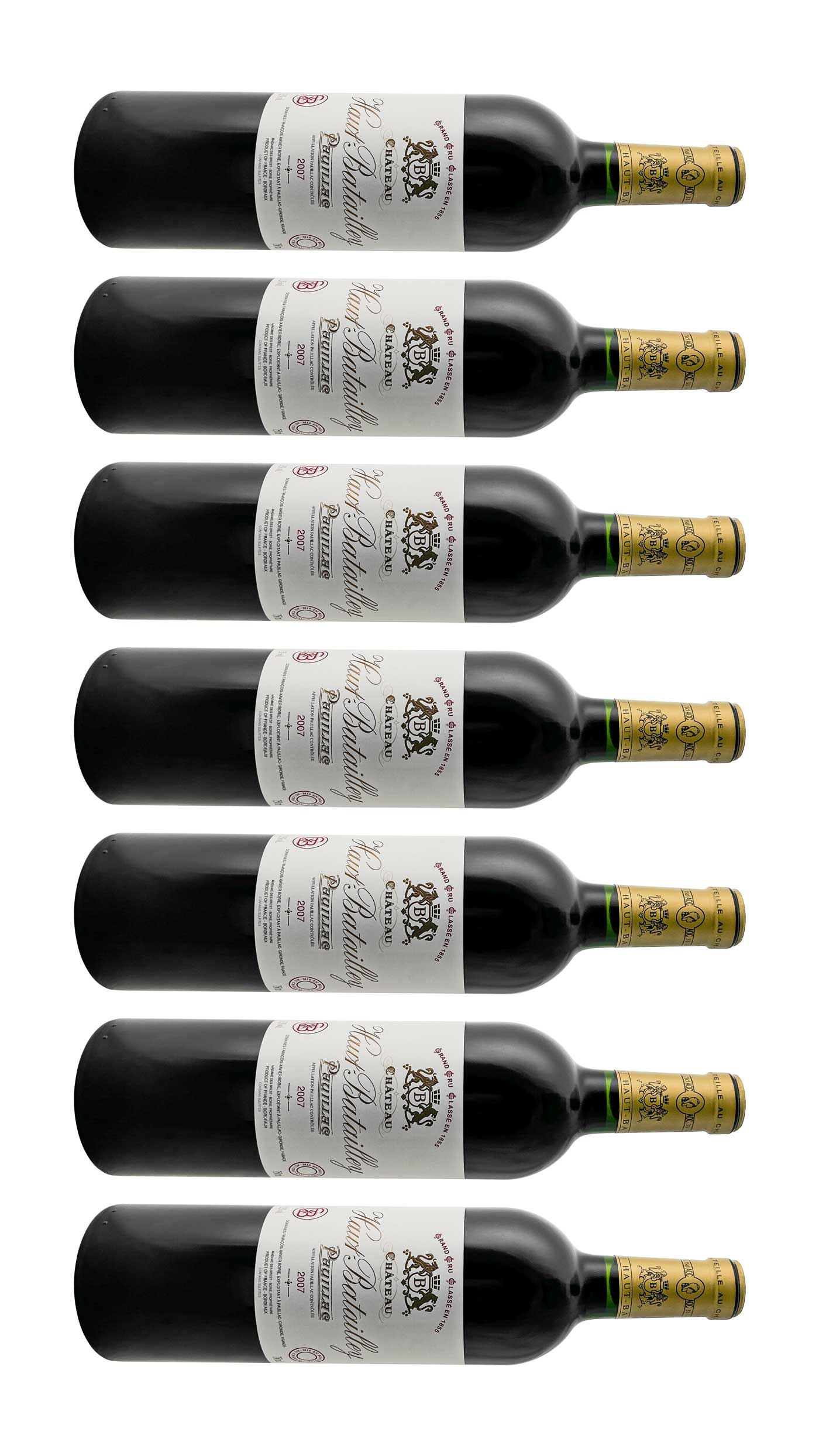 Mehrere Weinflaschen mit Rotwein von Chateau Haut Batailley