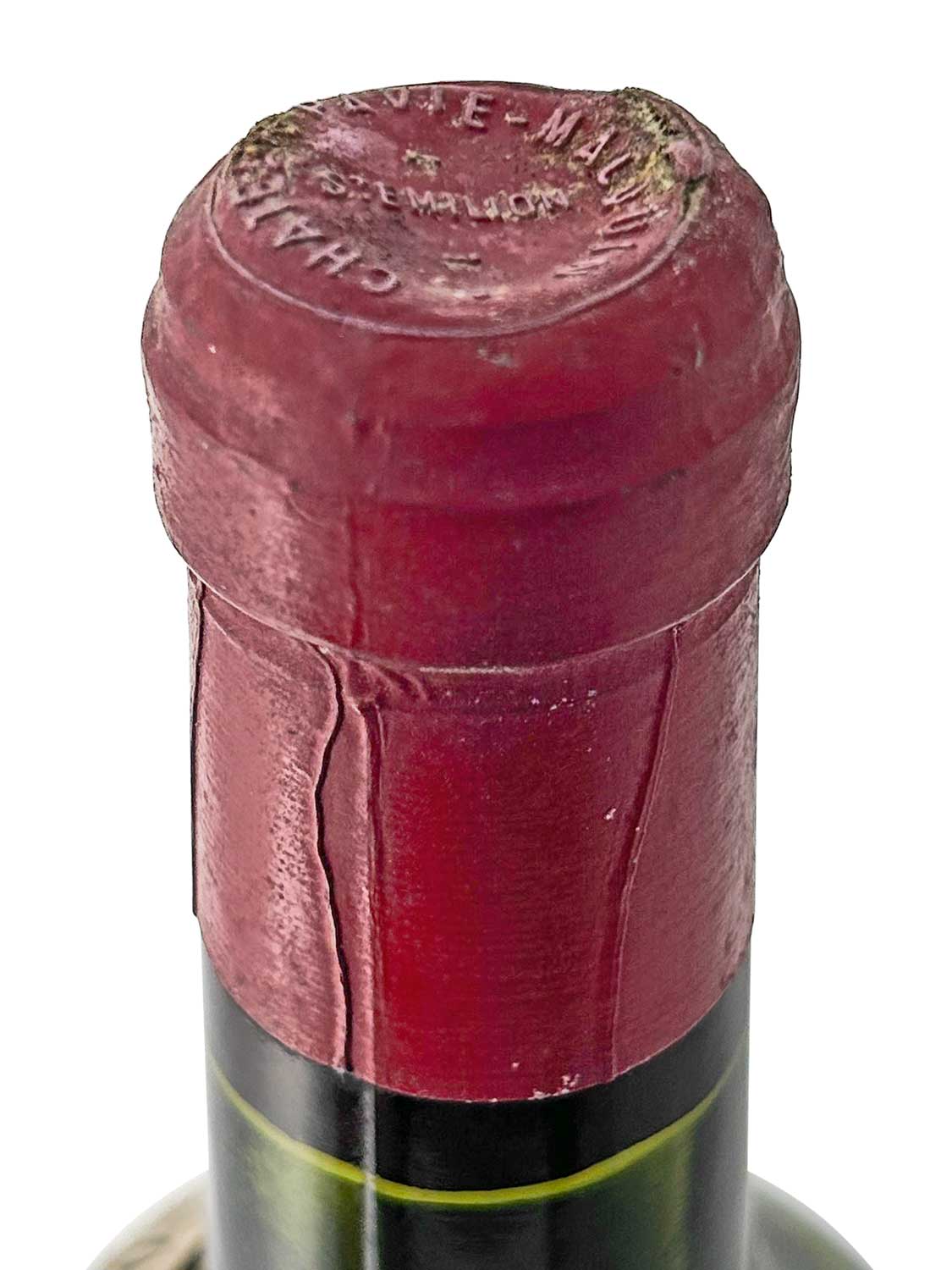 Kapsel einer Weinflasche von Chateau Pavie Macquin 1950