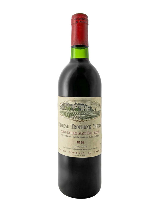 Rotweinflasche von Château Troplong Mondot, Jahrgang 1981. Etikett zeigt eine Abbildung des Weinguts und den Text 'Château Troplong Mondot, Saint-Émilion Grand Cru Classé'.