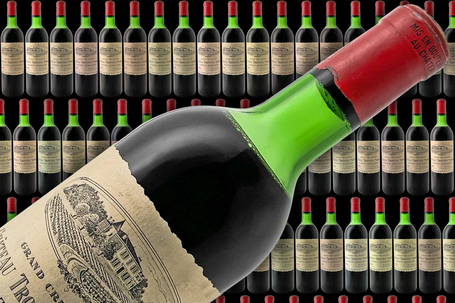 Der Banner zeigt viele Weinflaschen im Hintergrund und im Vordergrund eine Flasche Rotwein von dem Weingut Chateau Troplong Mondot.