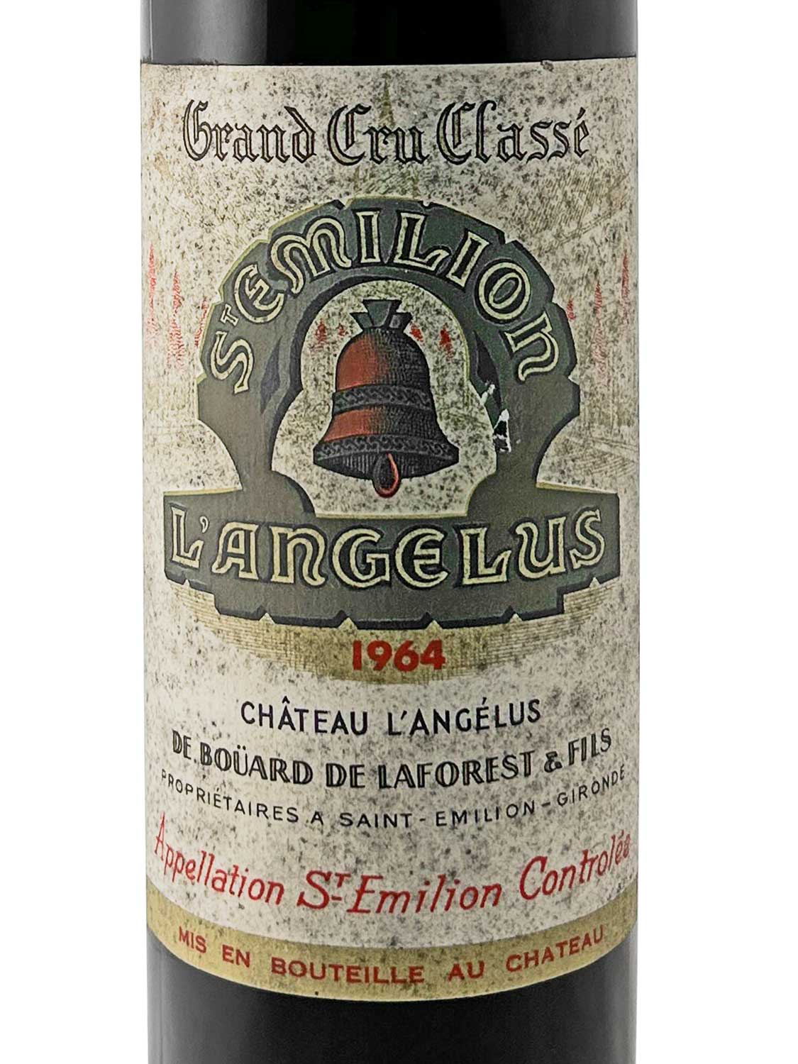 Weinetikett von Château L'Angelus 1964. Auf dem Etikett steht 'Grand Cru Classé', 'St Émillon', 'Château L'Angelus', '1964', 'DE BOÜARD DE LAFOREST & FILS', 'Appellation St-Émilion Contrôlée'.