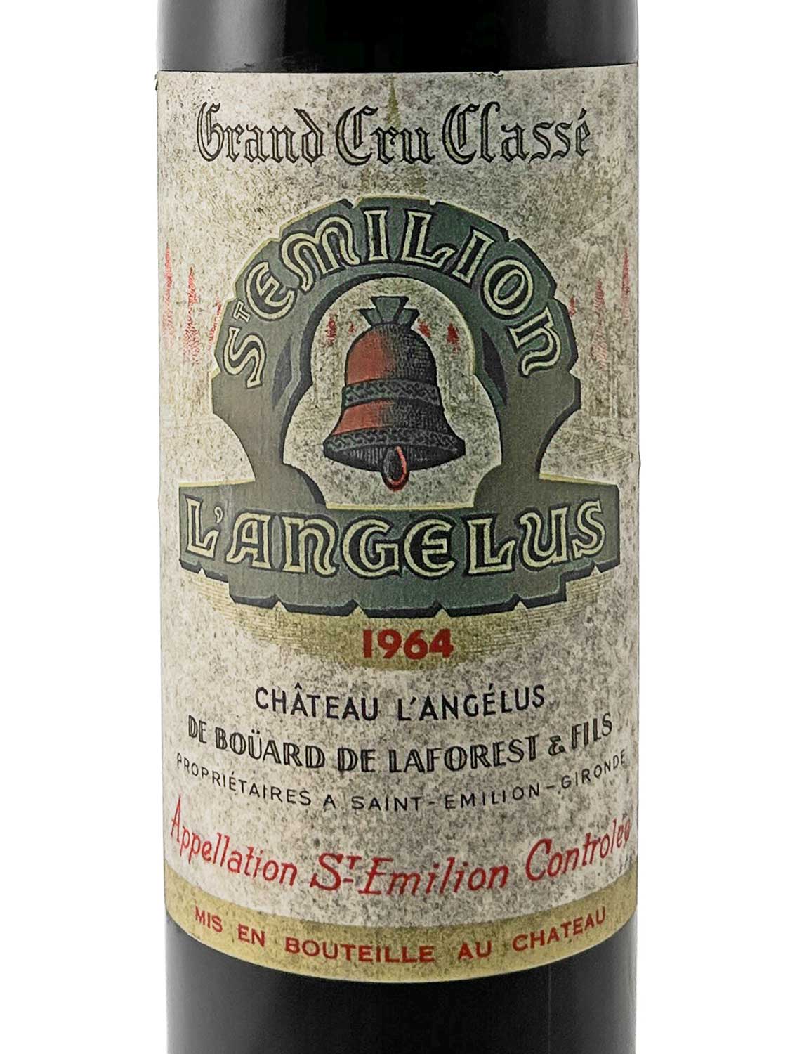 Weinflasche mit Etikett von Château L'Angélus 1964, Grand Cru Classé aus Saint-Émilion, mit Glockenmotiv und roter Jahreszahl.