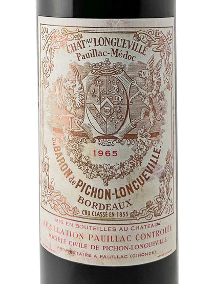 Weinflaschenetikett mit Wappen, zwei Fabelwesen und der Aufschrift 'Château Longueville Pauillac-Médoc 1965 Baron de Pichon-Longueville Bordeaux Cru Classé en 1855'
