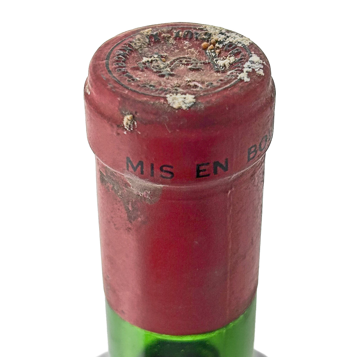 Château Carbonnieux 1969 Originalkapsel in Nahaufnahme mit geprägtem Emblem und Aufdruck Mis en bouteille