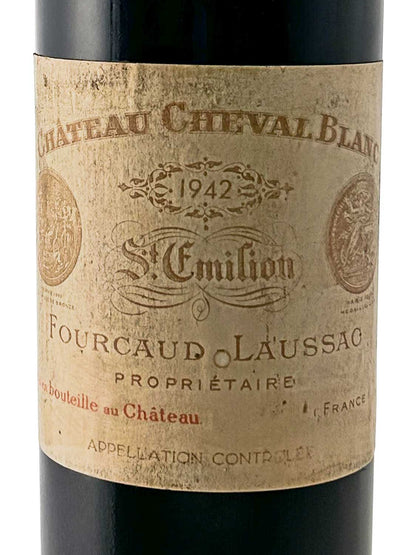 Weinflaschenetikett von Château Cheval Blanc 1942 mit der Aufschrift 'St. Emilion', 'Fourcaud Laussac', 'Propriétaire', 'Mis en bouteille au Château', 'France' und 'Appellation Contrôlée'