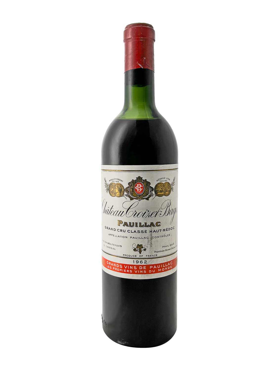 Flasche Château Croizet-Bages 1962 mit rotem Kapselverschluss und weißem Etikett mit goldenen Medaillen und rotem Schriftband.