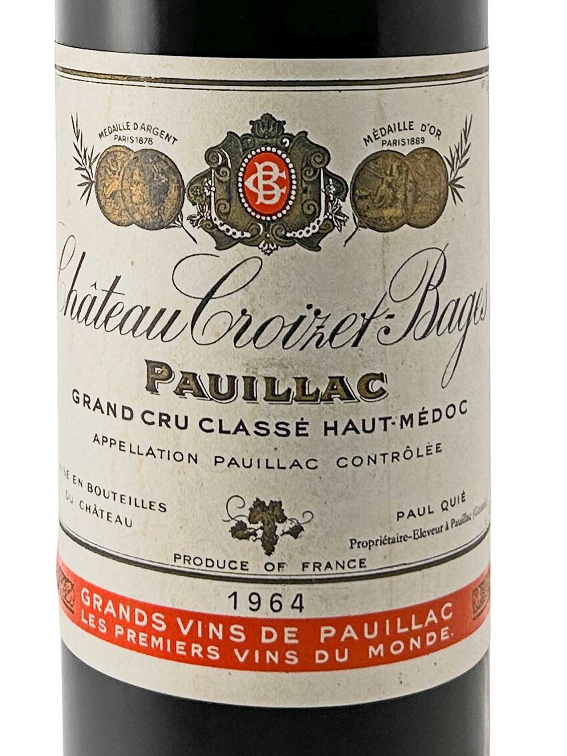 Weinflasche mit Etikett von Château Croizet-Bages 1964, Pauillac, Grand Cru Classé Haut-Médoc, mit Medaillenabbildungen und rotem Schriftband.