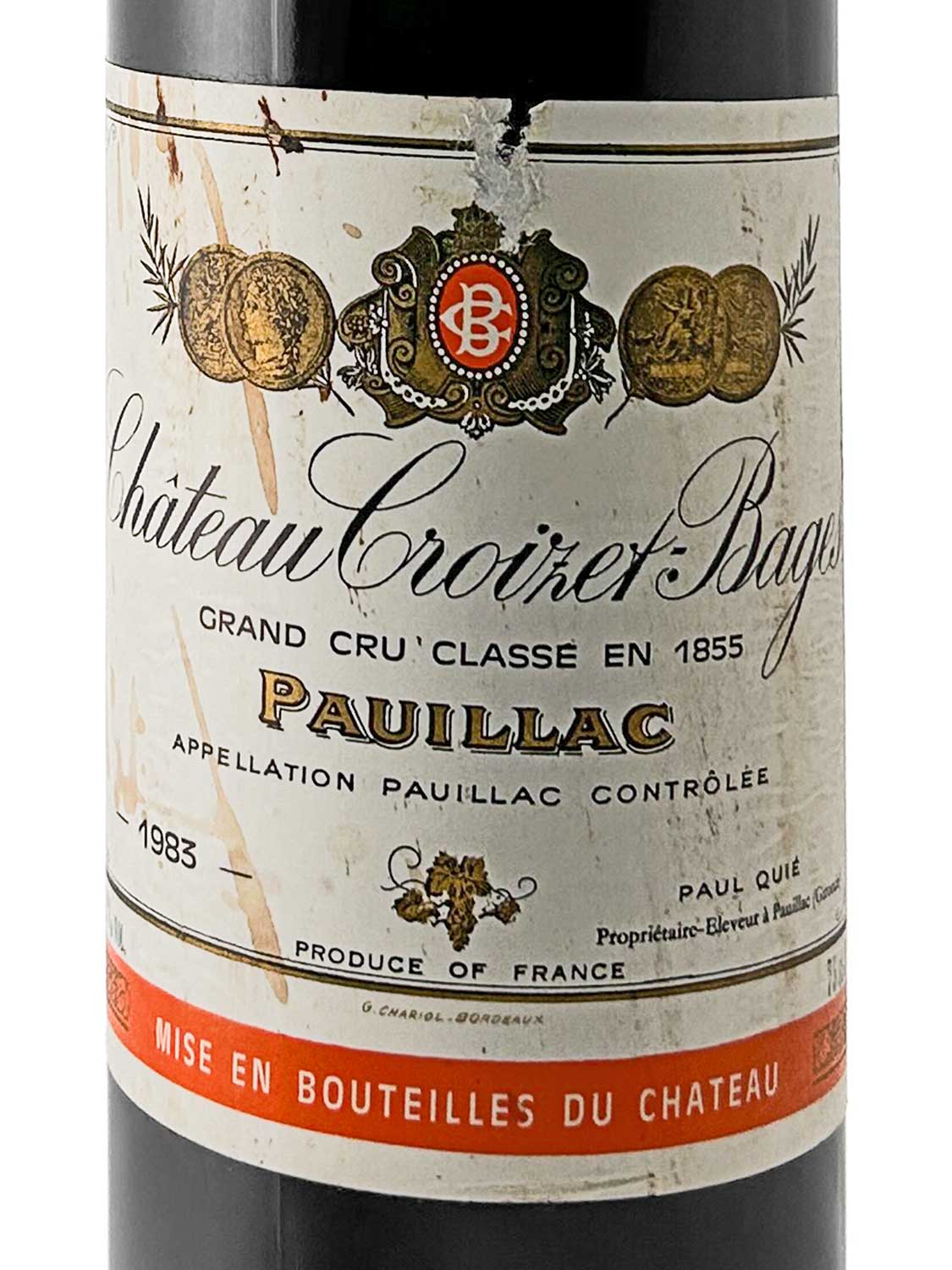 Weinetikett von Château Croizet Bages 1983 mit der Bezeichnung 'Grand Cru Classé en 1855', Herkunft Pauillac, Frankreich, und dem Hinweis 'Mise en bouteilles du Château'.