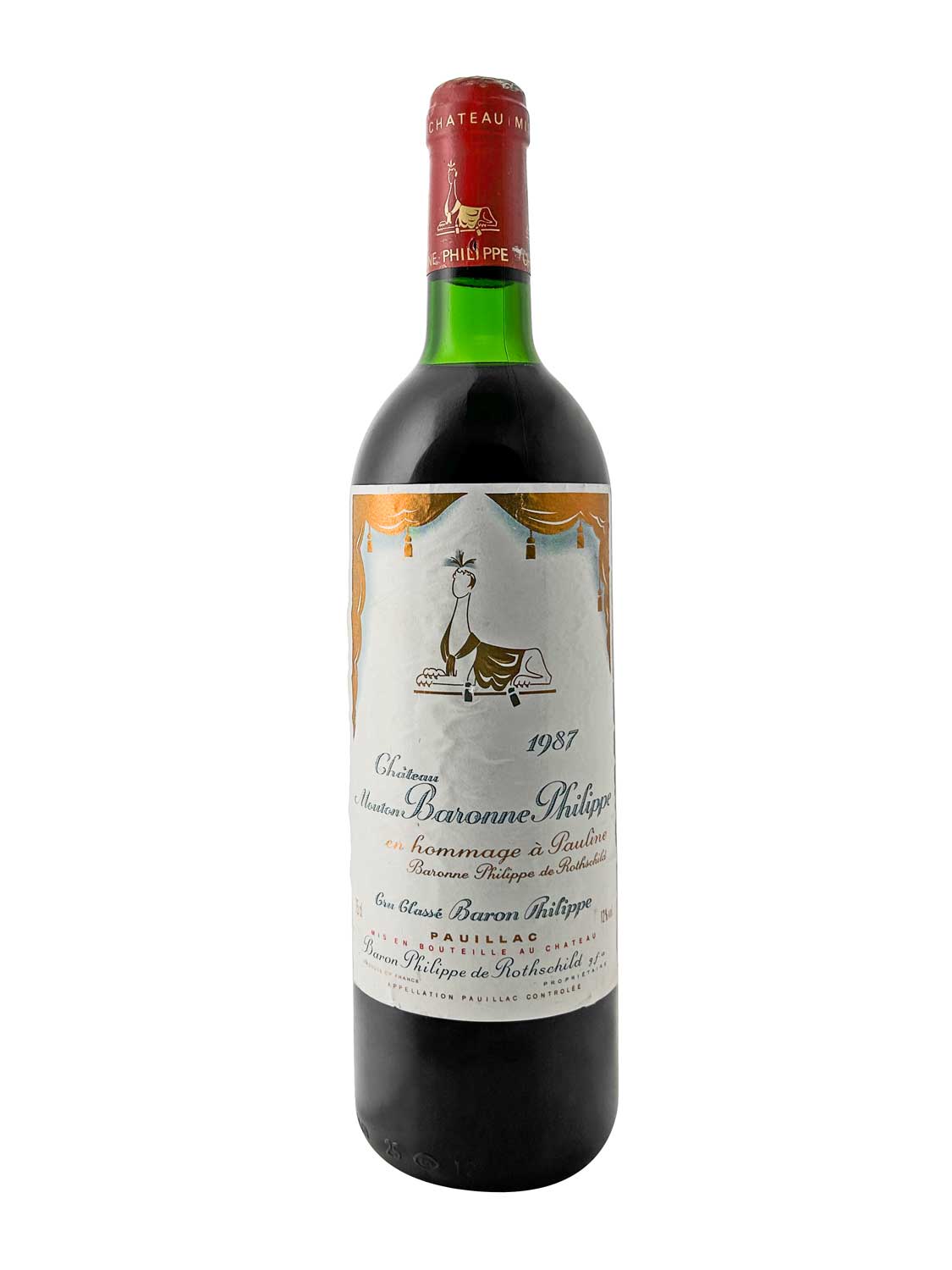 Flasche Château d'Armailhac 1987 mit rotem Kapselverschluss und weißem Etikett, darauf ein stilisierter Hahn und Text in Schwarz und Gold.