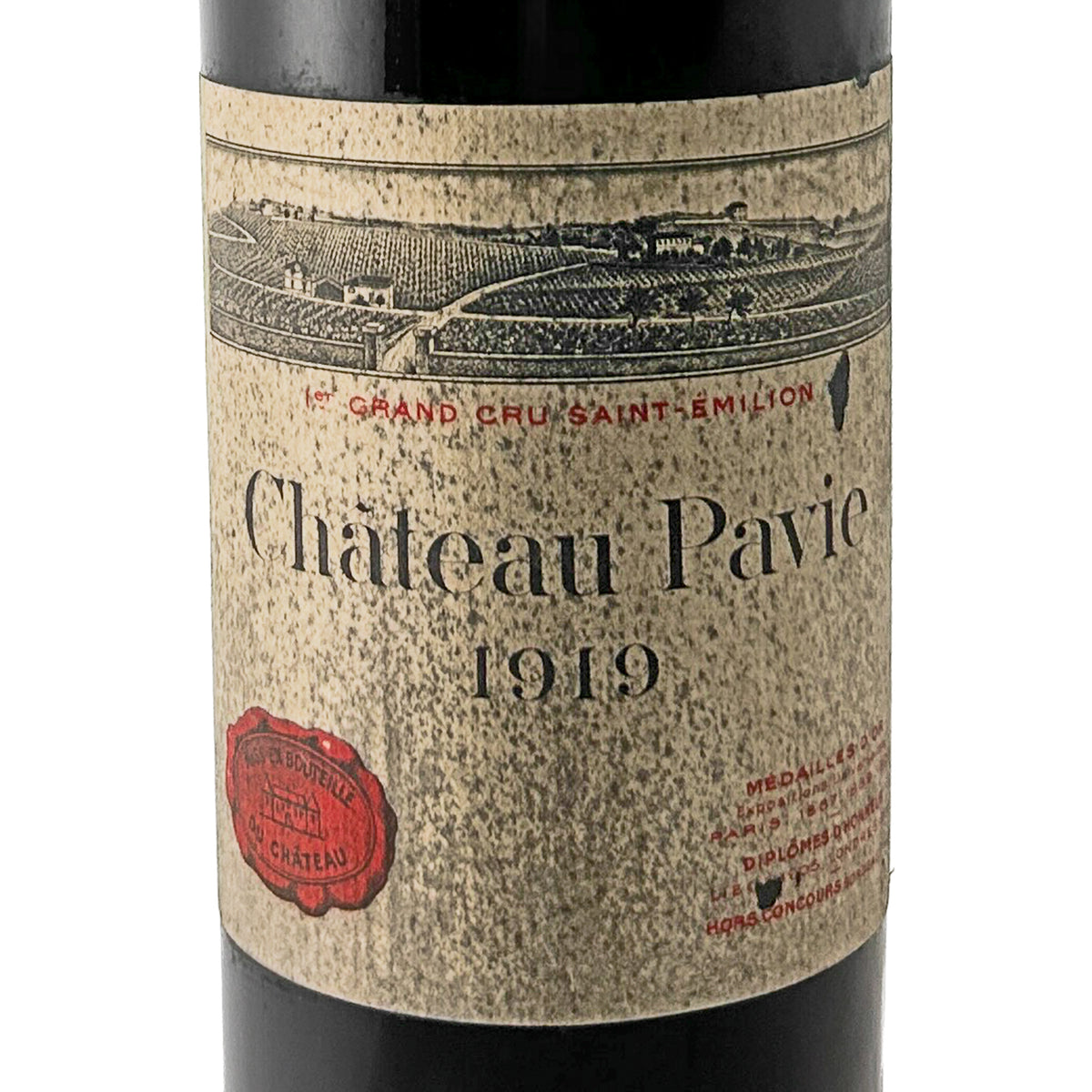Château Pavie 1919 Etikett in Nahaufnahme mit altersbedingter Fleckenbildung und Château-Wachssiegel „Mise en bouteille au Château"