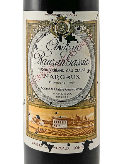 Weinflasche mit Etikett von Château Rauzan-Gassies 1957, Second Grand Cru Classé Margaux, mit goldfarbenem Rahmen und Illustration eines Weinguts im unteren Bereich