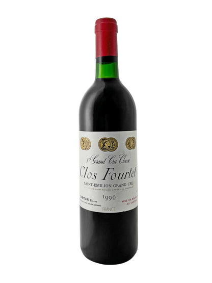 Eine Weinflasche von Clos Fourtet 1990